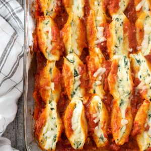 Spinach and ricotta stuffed shells in baking dish