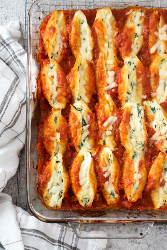 Spinach and ricotta stuffed shells in baking dish