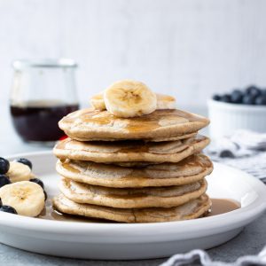 Stack of oat flour pancakes on a plate