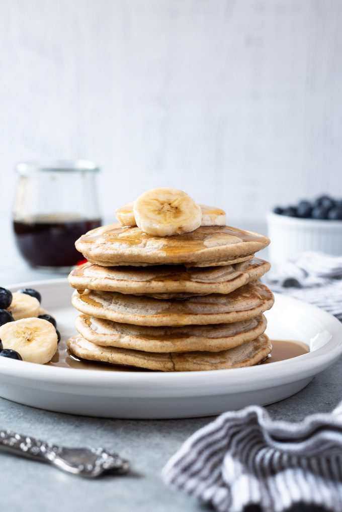 Stack of oat flour pancakes on a plate