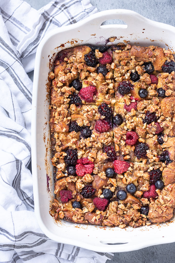 Overnight french toast casserole cut into squares in baking dish