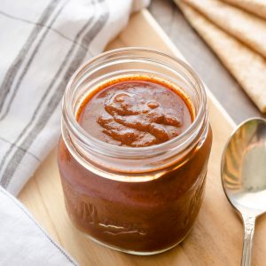Homemade enchilada sauce in a jar
