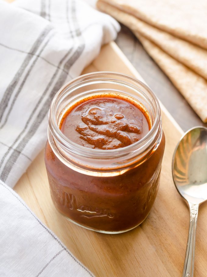 Homemade red enchilada sauce in a jar