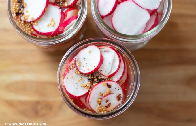 Three jars of pickled radishes