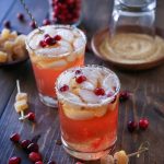 Two cranberry dark and stormy cocktails.