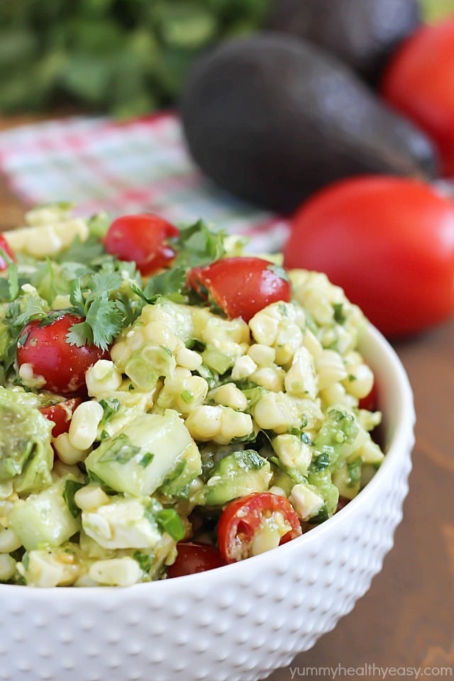 Bowl of grilled corn and avocado salad