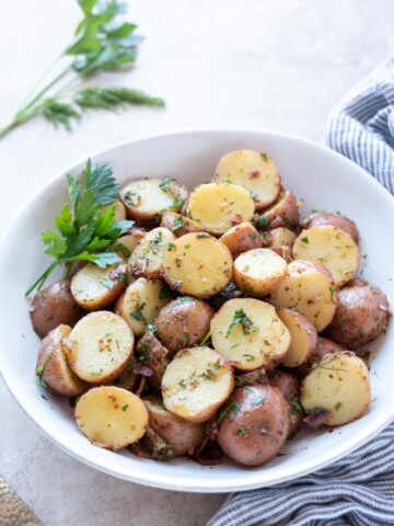 German potato salad in a white bowl