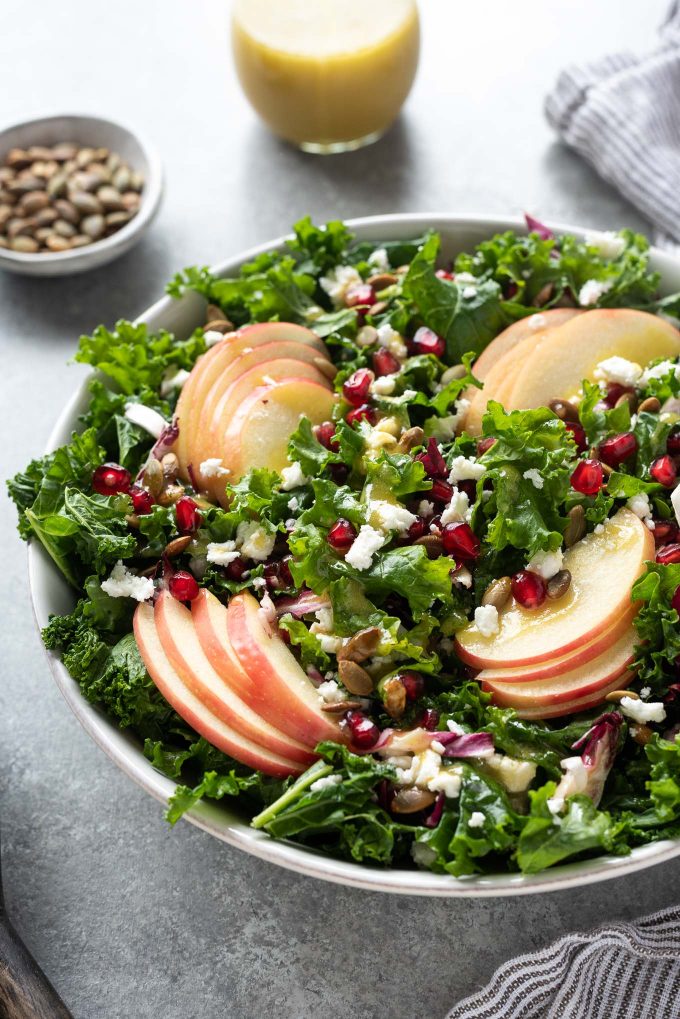 Kale apple salad with pomegranate and pepitas