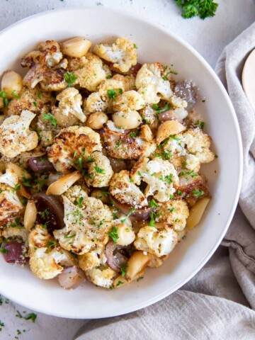 Roasted cauliflower in a white bowl