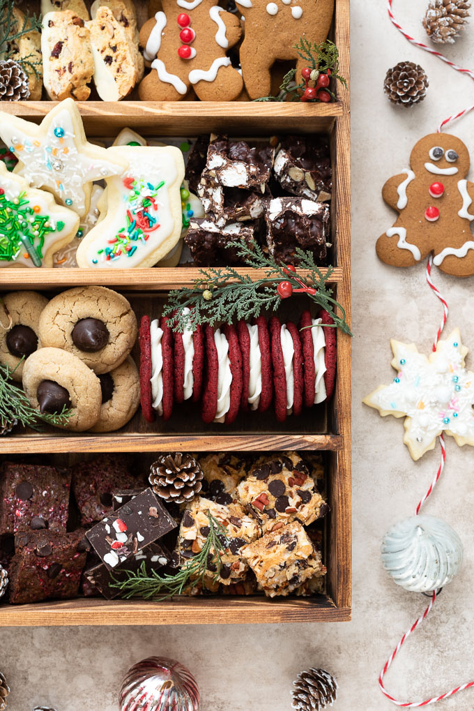 Christmas cookie box filled with cookies, candy and holiday decorations
