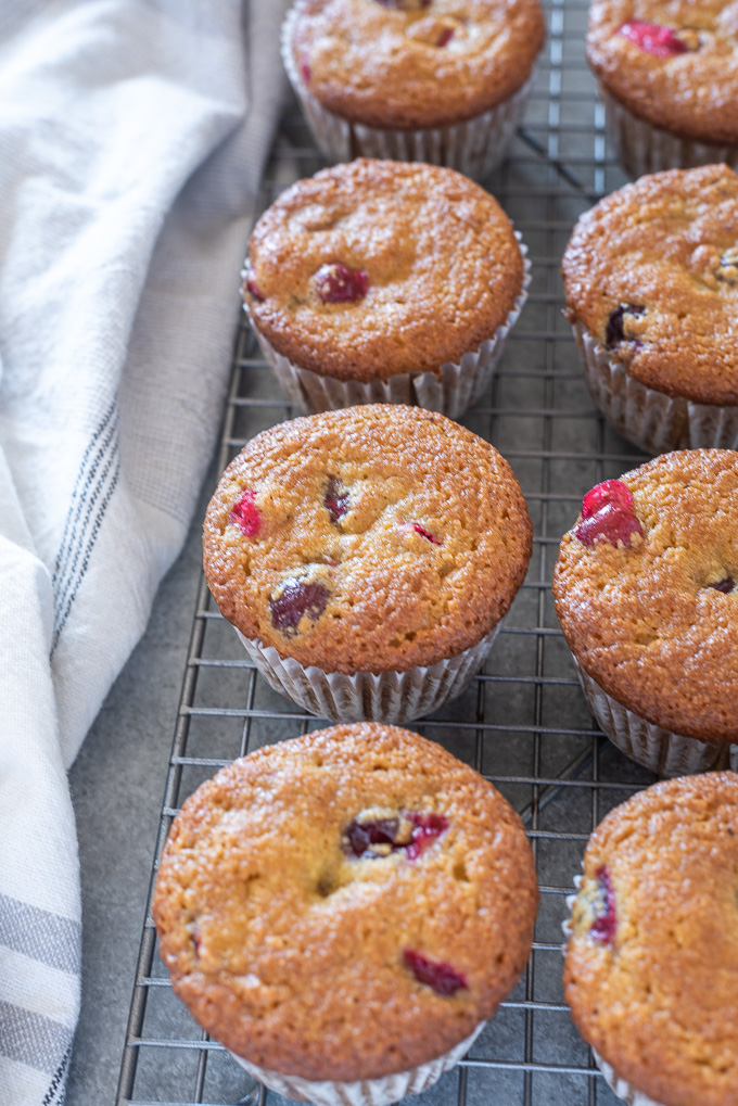 Healthy cranberry orange muffins on a wire rack