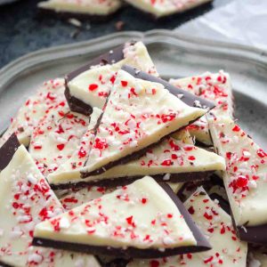 Wedges of peppermint bark on a silver plate