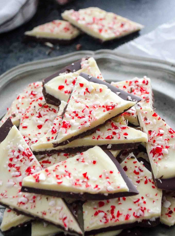 Wedges of peppermint bark on a silver plate