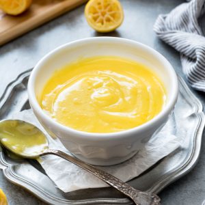 Lemon curd in a white bowl