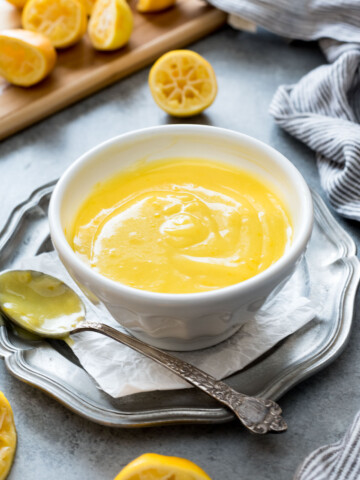 Lemon curd in a white bowl