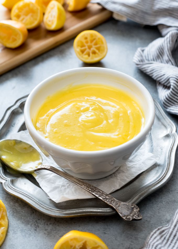 Lemon curd in a white bowl