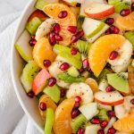 Winter fruit salad in a white bowl