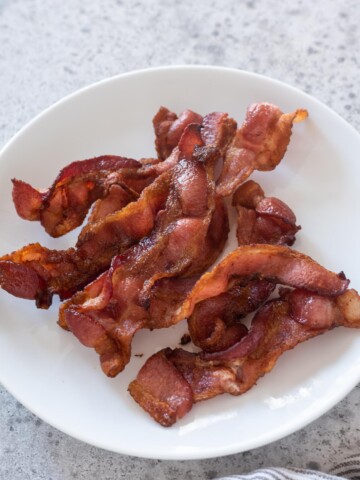 Air fryer bacon on a white plate