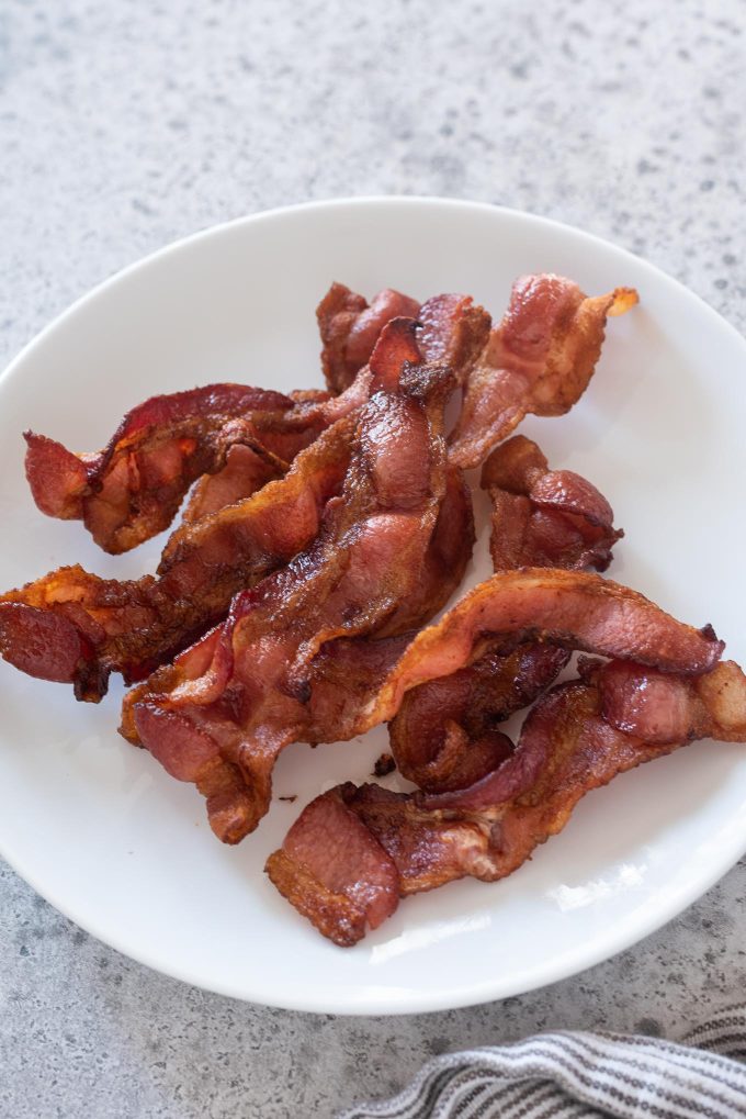 Air fryer bacon on a white plate