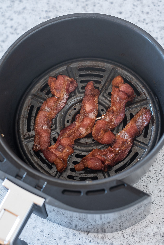 Slices of crispy bacon in air the air fryer