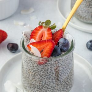 Chia seed pudding in a jar with a spoon digging in