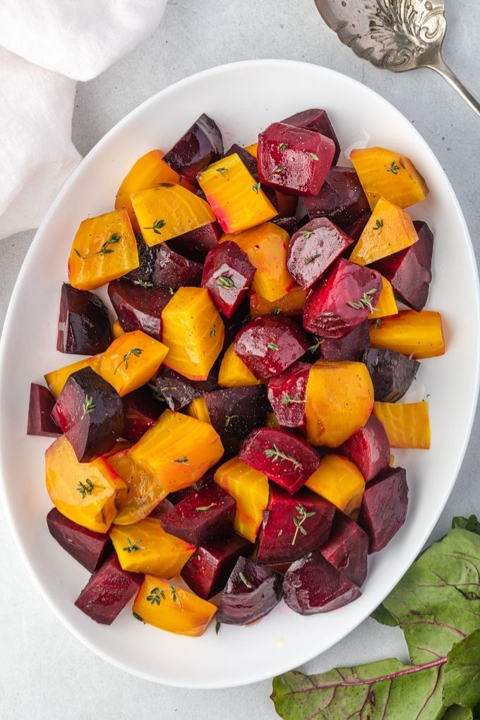 Roasted beets on a white platter
