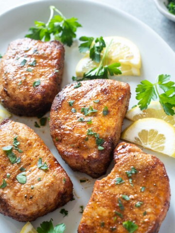 Air fryer pork chops on a platter
