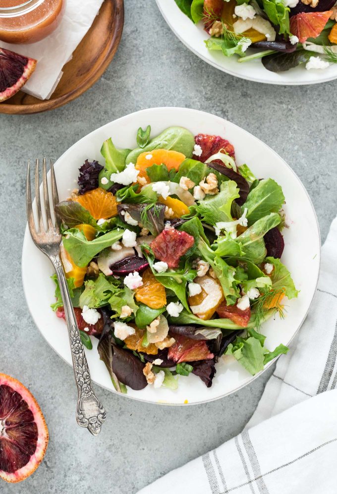 Roasted beet salad on a plate with a fork