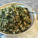 Dirty rice with collards and leeks in a bowl