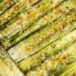 Roasted leeks in a baking dish