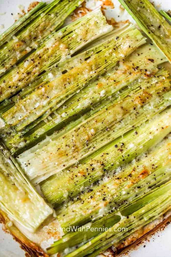 Roasted leeks in a baking dish