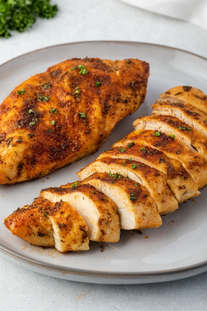 Air fryer chicken breasts on a plate