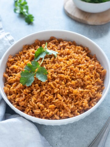 Easy Mexican rice in white serving bowl