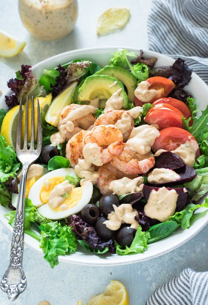 Shrimp louie salad drizzled with louie dressing