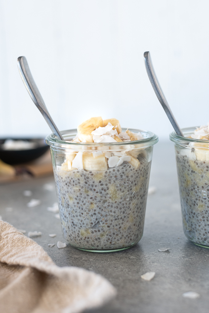 Banana chia pudding in a jar with a spoon