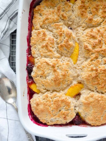 Blackberry peach cobbler in baking dish