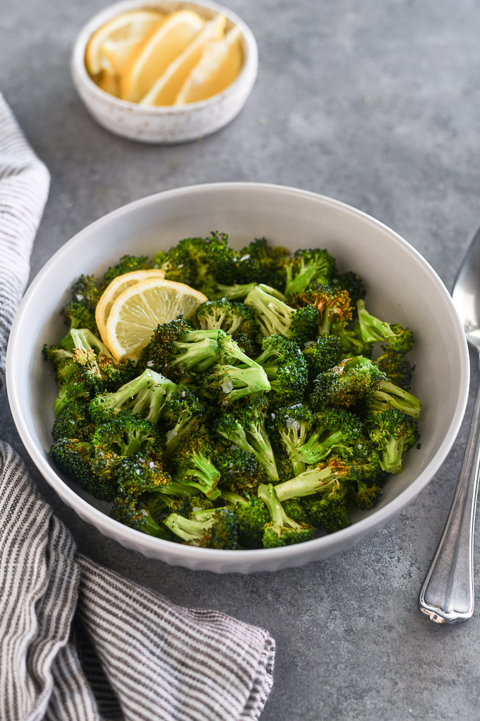 Bowl of air fryer broccoli with lemon