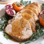 Boneless turkey breast sliced and covered with gravy