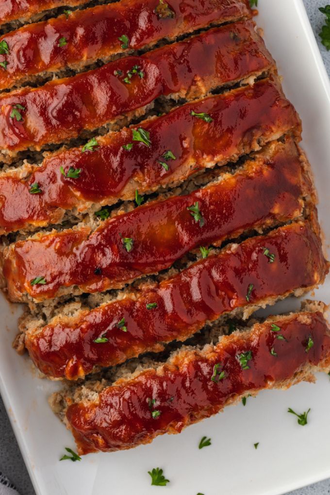 Sliced turkey meatloaf with oatmeal on a platter