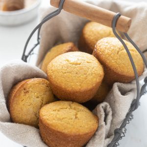 Honey cornbread muffins in a basket