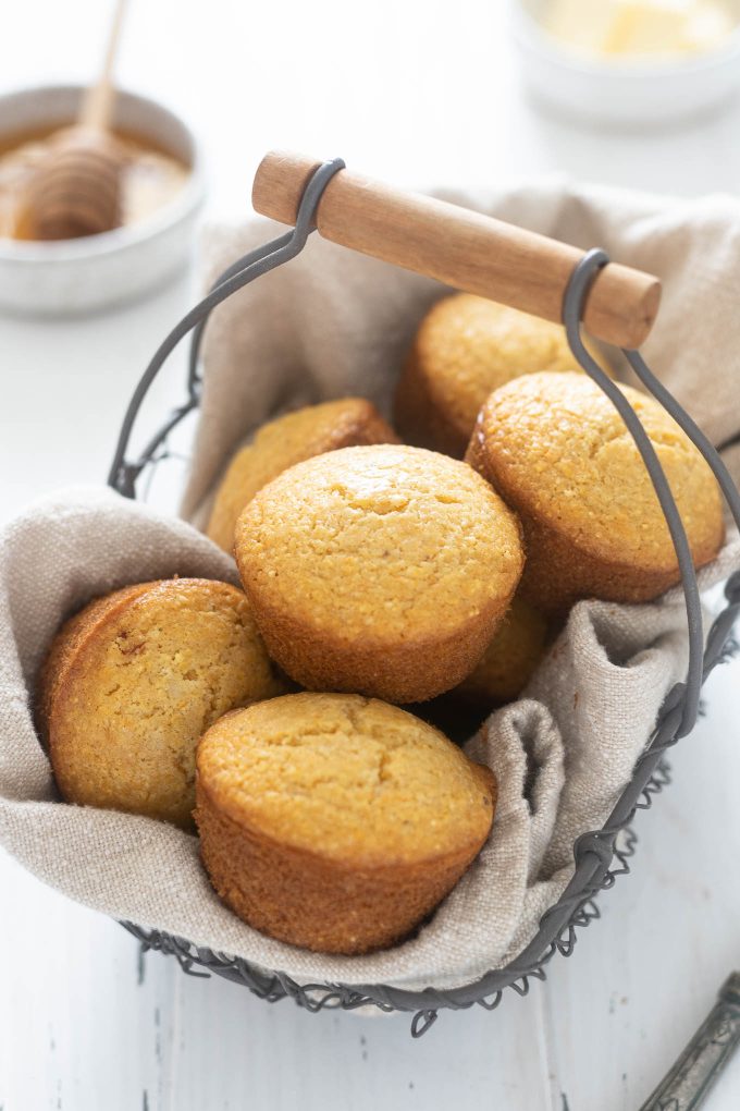 Honey cornbread muffins in a basket