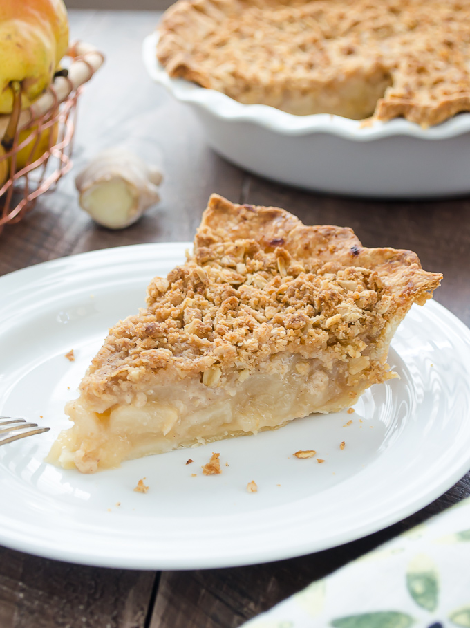 Pear pie with streusel topping on a plate