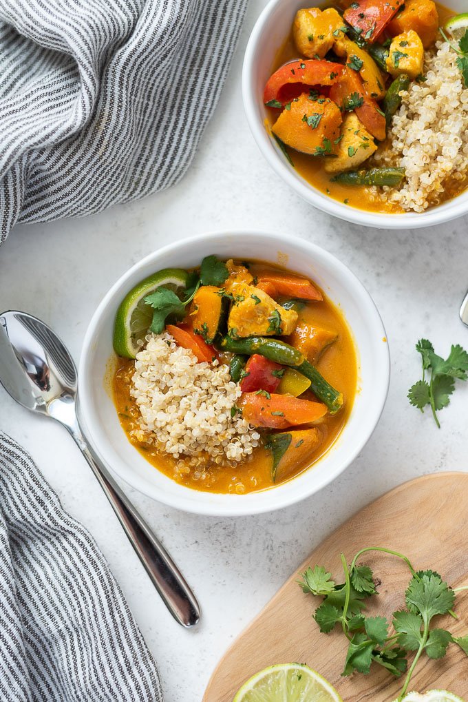 Pumpkin curry in a bowl over quinoa