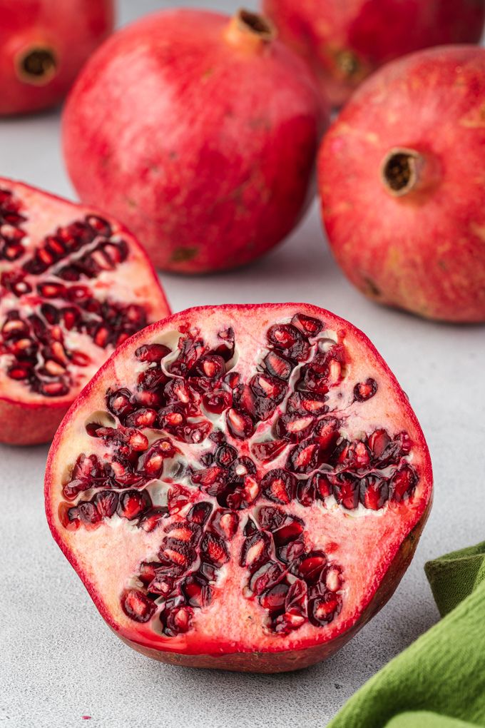 Halved pomegranate in how to cut a pomegranate open tutorial