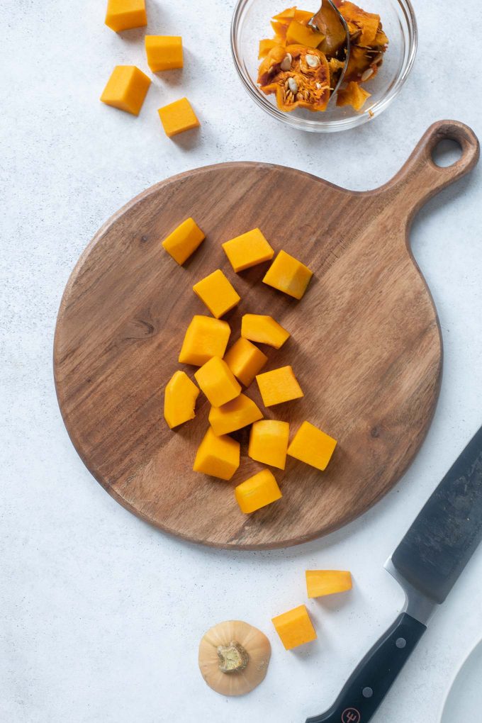 Cubed butternut squash on a cutting board