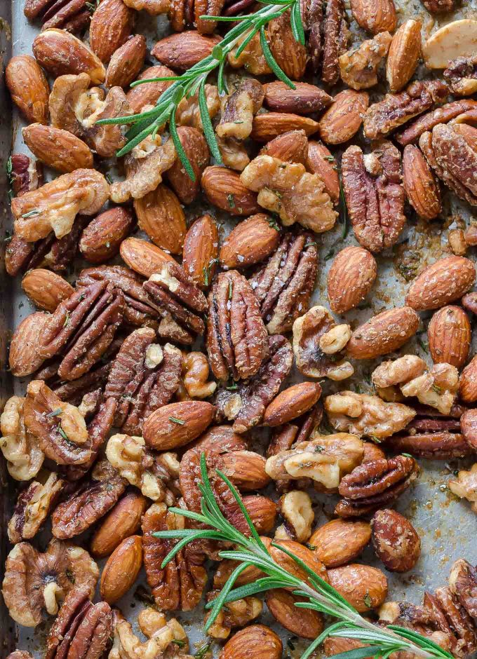 roasted almonds, walnuts and pecans on a baking sheet