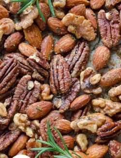 Roasted Almonds, walnuts and pecans on a baking sheet
