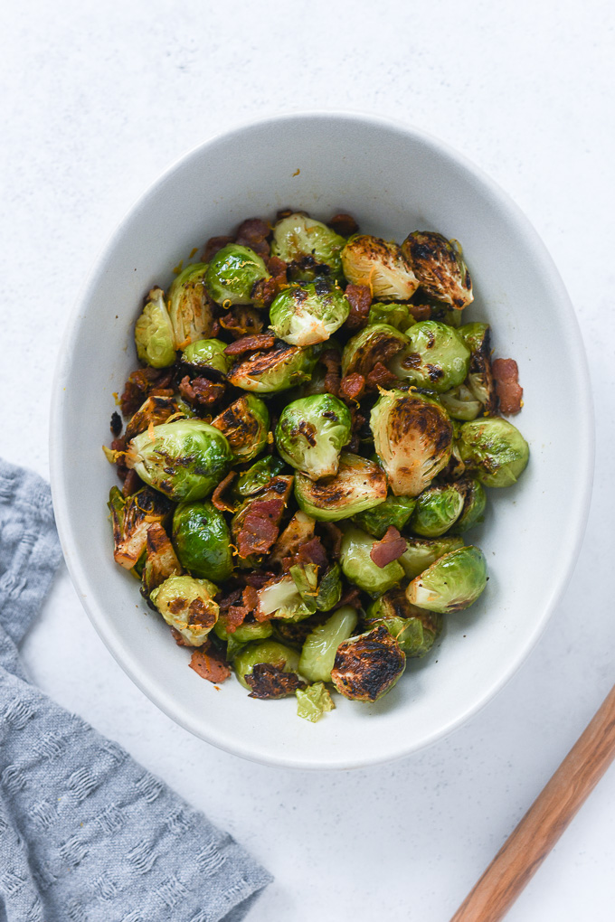 Pan fried brussels sprouts with bacon in a bowl