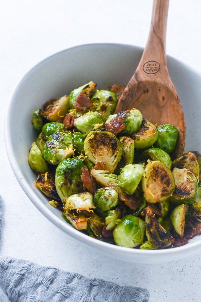 Brussels sprouts with bacon in a serving dish
