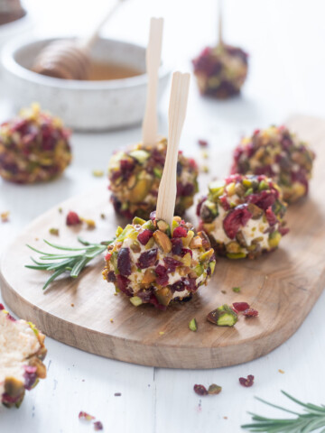 Mini goat cheese balls with wooden picks